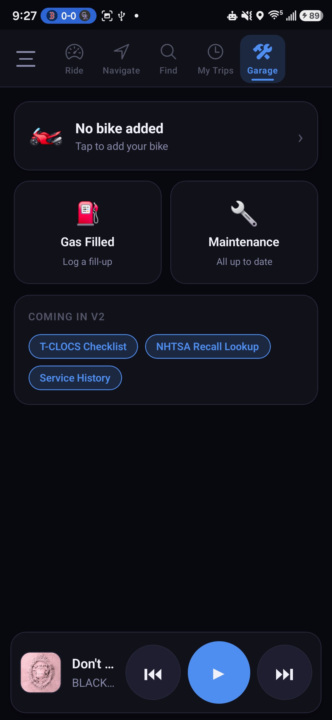 Garage tab with bike profile, fuel stats and quick action buttons